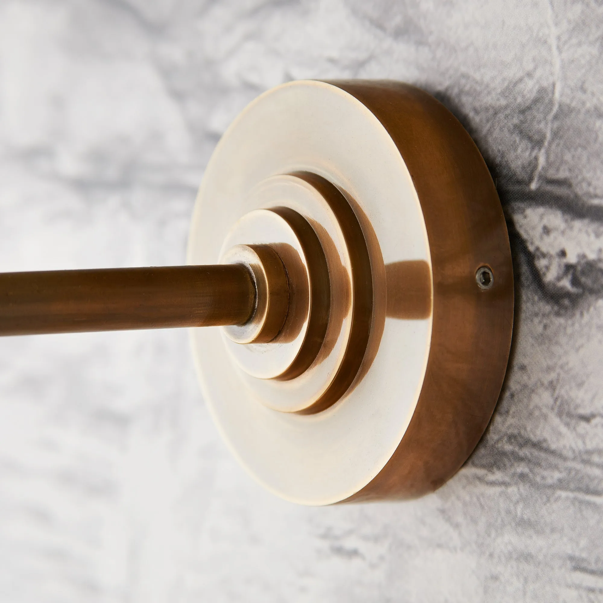 Curlew IP44 wall light in antique brass